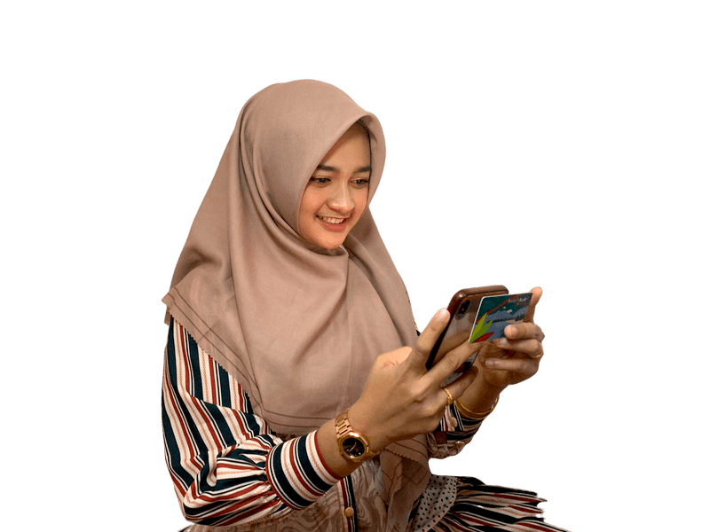 Pengguna Action melakukan Top up pengcard dengan menempelkan kartu pada bagian belakang handphone dengan mengaktifkan terlebih dahulu fitur NFC.