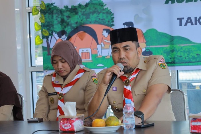 Pj Bupati Aceh Besar Muhammad Iswanto SSTP MM, menyampaikan sambutannya pada penutupan Karang Pamitran Gerakan Pramuka Kwarcab Aceh Besar, di Hotel Bunda, Takengon, Aceh Tengah, Sabtu (4/1/2025). FOTO/ PROKOPIM PEMKAB ACEH BESAR