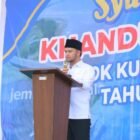 Said Fadheil saat menyampaikan sambutan pada acara Khanduri Laot yang juga diisi santunan anak yatim di Kecamatan Samatiga, Rabu (21/1/2026). Foto: Pemkab Aceh Barat