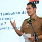 Sekda Aceh M. Nasir menyampaikan sambutan saat pembukaan Uji Kompetensi SDM Vokasional di USK Banda Aceh, Senin (9/2/2026). Foto: Dok. Biro Adpim Setda Aceh