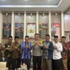 Foto bersama usai pertemuan antara DSI Banda Aceh dan Polresta Banda Aceh di Markas Polresta, Kamis (12/2/2026). Foto: Dok. Diskominfo Kota Banda Aceh