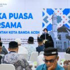 Wali Kota Banda Aceh Illiza Sa’aduddin Djamal menyampaikan sambutan saat acara buka puasa bersama keuchik dan imum mukim di Pendopo Wali Kota Banda Aceh, Senin (9/3/2026). Foto: Dok. Prokopim Kota Banda Aceh