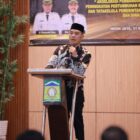 Ketua DPRK Aceh Besar Abdul Mucthi, S.I.Kom menyampaikan arahan dalam Musrenbang RKPD 2027 di Aula BGTK, Ingin Jaya, Aceh Besar, Selasa (31/3/2026). Foto: Dok. Istimewa 