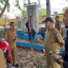 Petugas Diskominfotik Kota Banda Aceh melakukan survei titik pemasangan CCTV di kawasan Underpass Beurawe, Senin (4/5/2026). Foto: Dok. Diskom Kota Banda Aceh