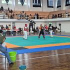 Atlet tarung derajat Pidie sedang bertarung untuk lolos ke PORA Aceh Jaya dalam event Pra-PORA do GOR Banda Aceh, Jumat (19/6/2026) (Foto.IST).