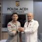 Ketua DPW PSI Aceh, T Rival Amiruddin, berfoto bersama Kapolda Aceh, Marzuki Ali Basyah, usai pertemuan silaturahmi di Polda Aceh yang membahas sinergi pembangunan daerah dan peningkatan kesejahteraan masyarakat, Selasa (2/6/2026). Foto: Dok. Istimewa