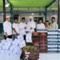 Plt Kepala Dinas Pendidikan Dayah Aceh, Muhsin, S.Pd.I., M.Pd.I., menyerahkan bantuan kepada Dayah Rahmatul Huda di Gampong Pante, Kecamatan Lhoksukon, Kabupaten Aceh Utara, Jumat (3/7/2026). Foto: Dok. Istimewa 