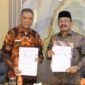 Bupati Pidie H. Sarjani Abdullah menandatangani perjanjian kerja sama dengan Kantor Wilayah Direktorat Jenderal Kekayaan Negara (Kanwil DJKN) Aceh di Pendopo Bupati Pidie, Jumat (14/8/2026) (Foto.IST).
