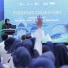 Wali Kota Banda Aceh Illiza Sa’aduddin Djamal menghadiri Pengembangan Kapasitas Usaha (PKU) Akbar kolaborasi PNM dan OJK di Aula OJK Provinsi Aceh, Jumat (14/8/2026). Foto: Dok. Prokopim Kota Banda Aceh