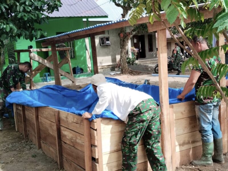 Satgas TMMD Reguler ke-129 Kodim 0102/Pidie membangun kolam budidaya ikan lele dan kandang ayam petelur sebagai sasaran tambahan di Desa Lhok Panah, Kecamatan Sakti, Pidie, Minggu (9/8/2026). Foto: Dok. Istimewa 