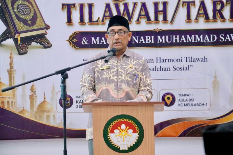 Staf Ahli Bidang SDM dan Keistimewaan Aceh Setdakab Aceh Barat Bukhari, ST., mewakili Bupati Aceh Barat membuka kegiatan Gema Tilawah/Tartil dan Maulid Nabi Muhammad SAW sekaligus launching Rumah Amal Nusa Dhien di Aula BSI KCP Meulaboh, Kamis (3/9/2026). Foto: Dok. Istimewa 