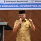 Asisten Administrasi Umum Sekretariat Daerah Aceh Dr. A. Murtala menyampaikan sambutan pada kegiatan Penyampaian Hasil Monev Pelayanan Informasi Publik Pemerintah Aceh Tahun 2026 di Banda Aceh, Selasa (8/9/2026). Foto: Dok. Istimewa 