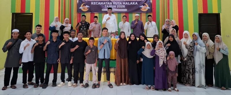 Plt Camat Kuta Malaka Fata Muhammad, S.Pd.I., M.M., membuka Training Center (TC) Kafilah Kecamatan Kuta Malaka sebagai persiapan menghadapi MTQ ke-35 Kabupaten Aceh Besar di Aula UDKP Kecamatan Kuta Malaka, Minggu (13/9/2026). Foto: Dok. Kecamatan Kuta Malaka