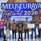 Bank Aceh Syariah bersama Bank Indonesia Provinsi Aceh meluncurkan dan menyerahkan perangkat QRIS Dinamis Soundbox dalam rangkaian pembukaan Meuseuraya Festival 2026 di Banda Aceh, Jumat (23/10/2026). Foto: Dok. Istimewa 