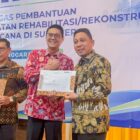 Bupati Pidie Jaya H. Syibral Malasyi menerima bantuan DIPA dana tugas pembantuan  sarana perdagangan pascabencana, Arch Hotel Bogor, Kota Bogor, Senin 5 Oktober 2026. Foto:Dok/Humas Prokopim Pidie Jaya 