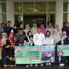 Wakil Wali Kota Banda Aceh Afdhal Khalilullah bersama Kakankemenag Kota Banda Aceh Salman Arifin menyambut dua siswi MTsN 1 Model Banda Aceh, Nafisah dan Aysha, peraih Medali Perak OPSI Nasional 2026 di Ruang VIP Bandara Internasional Sultan Iskandar Muda, Aceh Besar, Rabu (30/9/2026). Foto: Dok. Prokopim Kota Banda Aceh